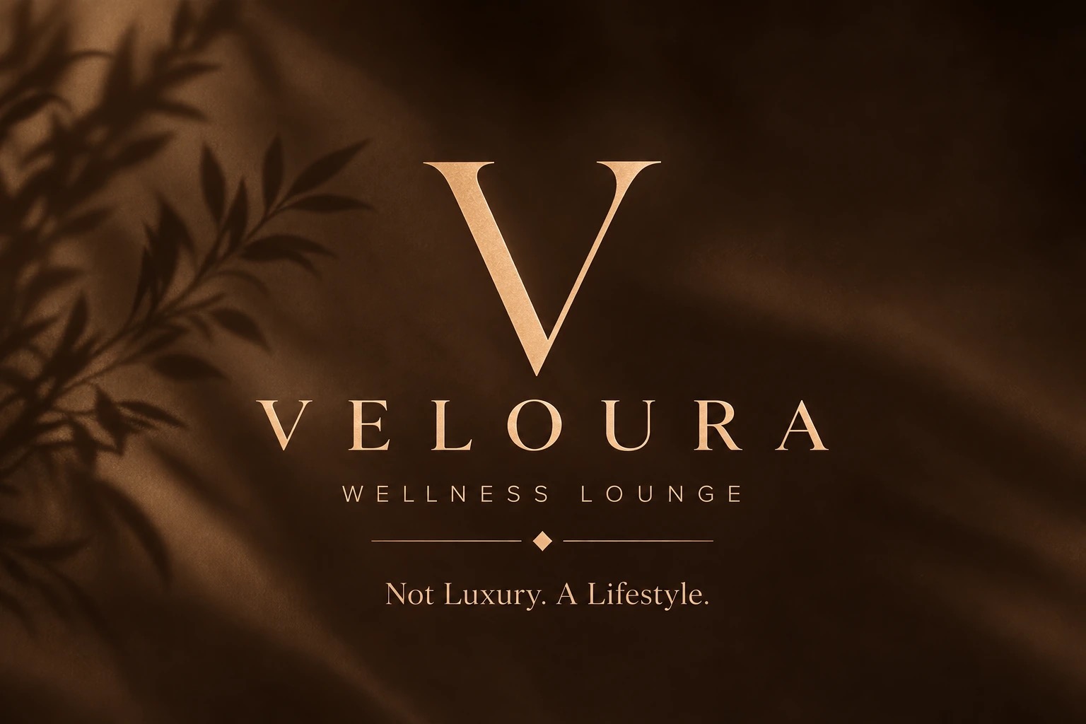 Veloura Wellness Lounge logo in champagne gold on espresso brown silk with leaf shadows
